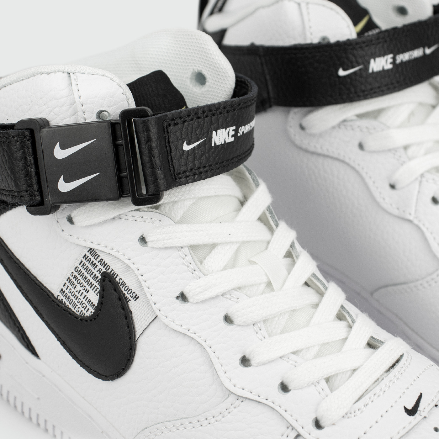 Nike air force 1 mid black white swoosh best sale