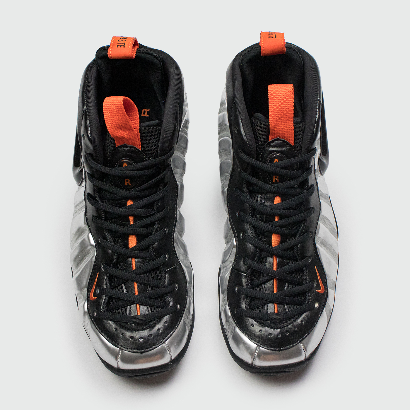 Nike foamposite black and orange on sale